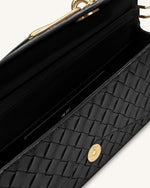 Celeste Sac à main enveloppe à anse supérieure, à texture tissée - Noir