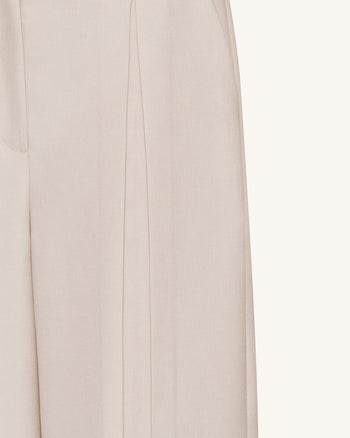 Pantalon plissé à jambes larges - Beige