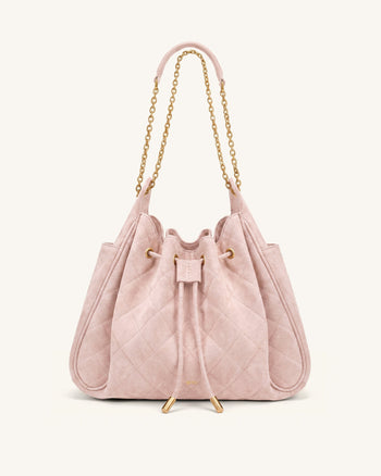 Rowan Sac seau matelassé à chaîne en faux suède - Rose