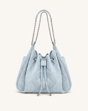 Rowan Sac seau matelassé à chaîne en faux suède - Bleu