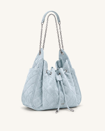 Rowan Sac seau matelassé à chaîne en faux suède - Bleu
