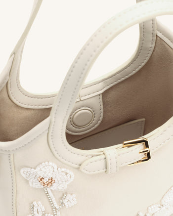 Brooke Mini sac à main orné d'une orchidée perlée avec ceinture - Ivoire