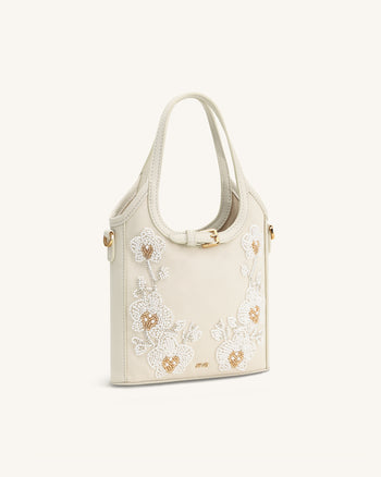 Brooke Mini sac à main orné d'une orchidée perlée avec ceinture - Ivoire