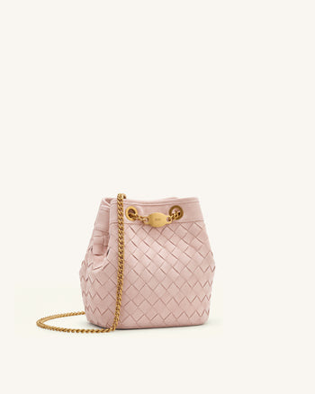 Yara Sac seau tissé à la main en similicuir suédé - Rose