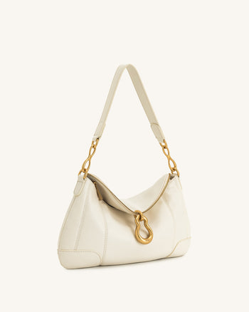 Sac bandoulière Jayla orné d’un pendentif en métal – Blanc