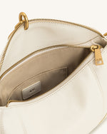 Sac bandoulière Jayla orné d’un pendentif en métal – Blanc