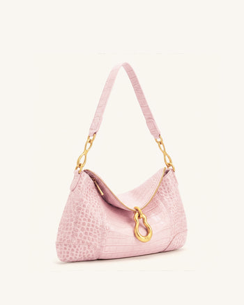 Jayla Sac à bandoulière orné d'un pendentif métallique - Rose effet croco