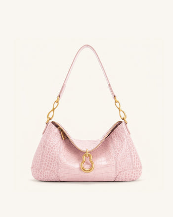 Jayla Sac à bandoulière orné d'un pendentif métallique - Rose effet croco
