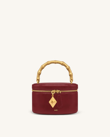 Natalie Sac porté main à pendentif géométrique en métal - Bordeaux
