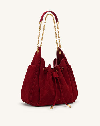 Rowan Sac seau matelassé à chaîne en faux suède - Rouge foncé