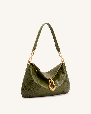 Jayla Sac à bandoulière orné d'un pendentif métallique - Vert effet croco