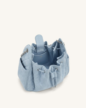 Rowan Sac seau matelassé à chaîne en faux suède - Bleu