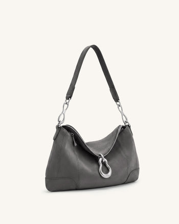 Jayla Sac à bandoulière en suédine orné d'un pendentif métallique - Gris foncé
