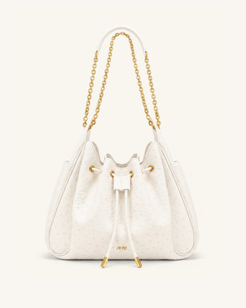 Rowan Sac seau à chaîne, cordon de serrage et détails froncés en faux cuir façon autruche - Blanc crème