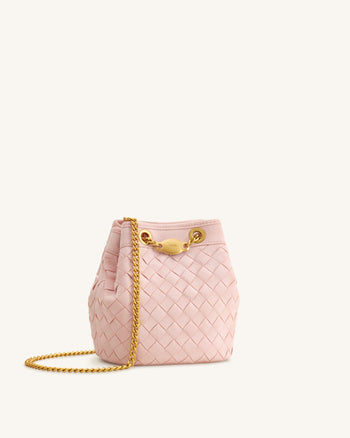 Yara Sac seau tissé à la main en similicuir suédé - Rose