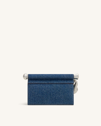 Holly Pochette ornée d'un pendentif métallique - Denim bleu