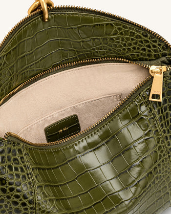 Jayla Sac à bandoulière orné d'un pendentif métallique - Vert effet croco