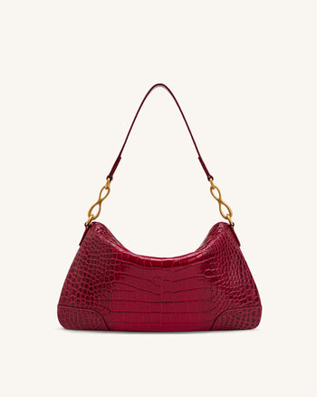 Jayla Sac à bandoulière orné d'un pendentif métallique - Rouge effet croco