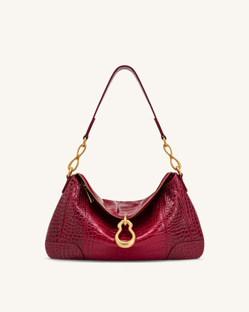Jayla Sac à bandoulière orné d'un pendentif métallique - Rouge effet croco