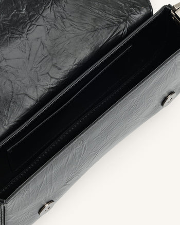 Le sac à bandoulière écrasé Joy - Noir