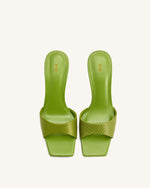 Mules à talon en cuir serpent Hannah – Vert