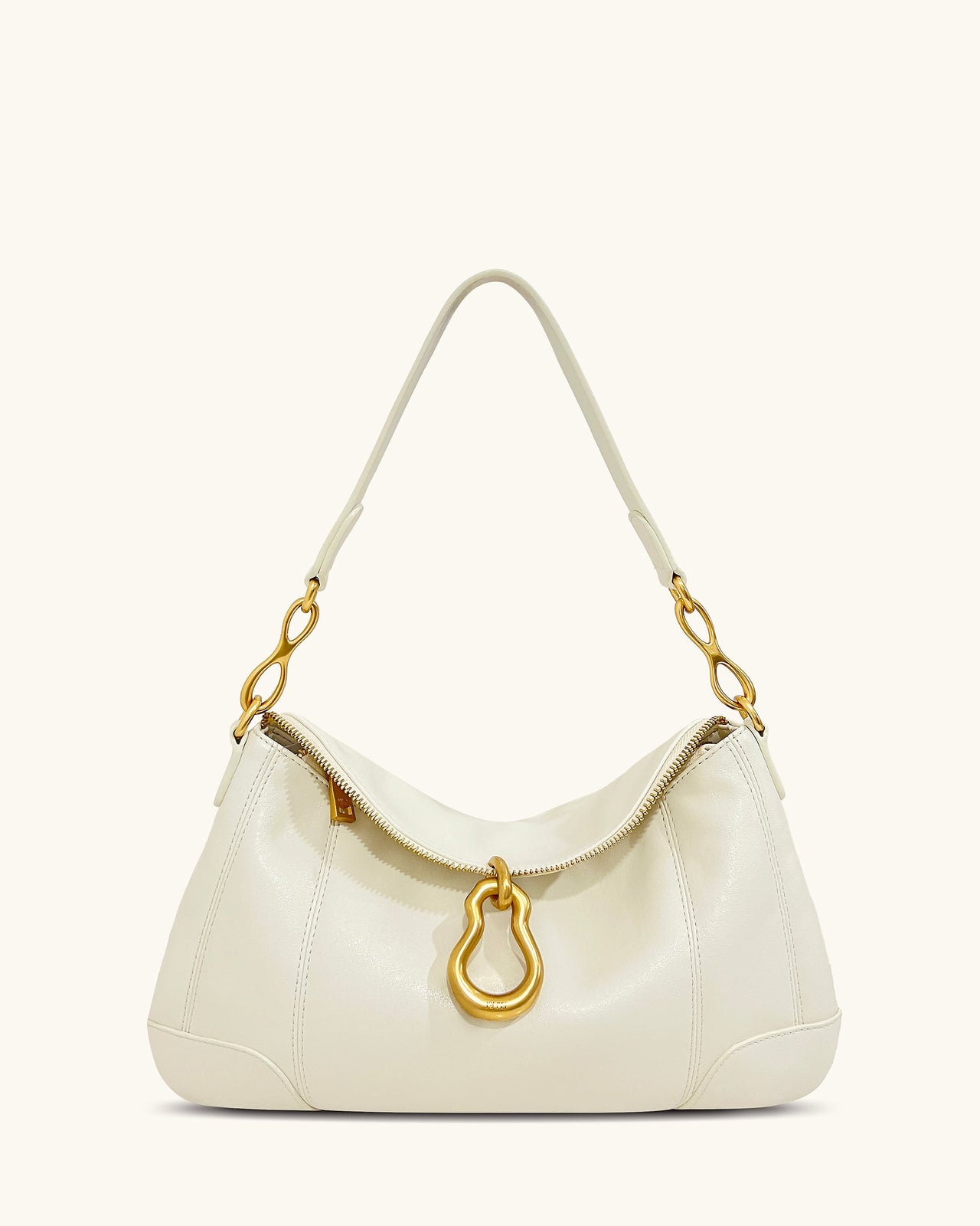 Sac bandoulière Jayla orné d’un pendentif en métal – Blanc
