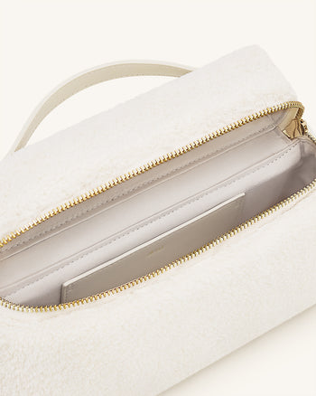 Sac à main en fausse fourrure Thea – Crème