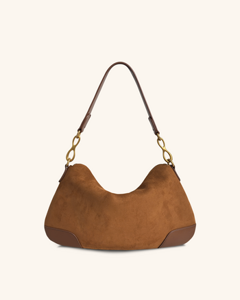 Sac épaule Jayla en daim synthétique orné d’un pendentif en métal – Marron