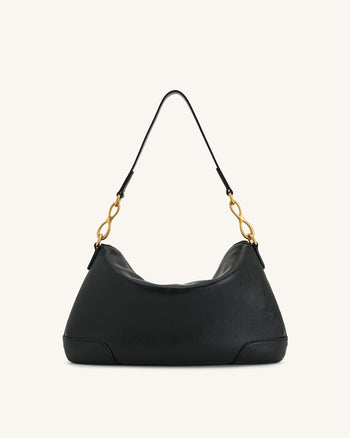 Sac bandoulière Jayla orné d’un pendentif en métal – Noir