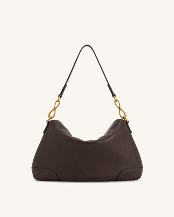Sac bandoulière Jayla orné d’un pendentif en métal – Marron foncé