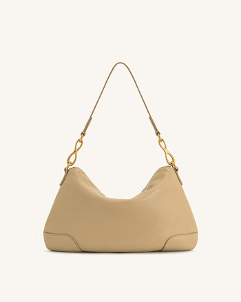 Sac bandoulière Jayla orné d’un pendentif en métal – Kaki