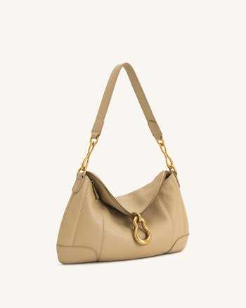Sac bandoulière Jayla orné d’un pendentif en métal – Kaki