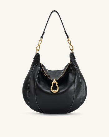 Sac à bandoulière orné d'un pendentif métallique Daria - Noir