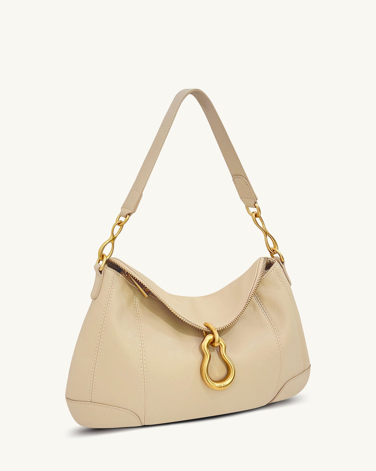 Sac bandoulière Jayla orné d’un pendentif en métal – Kaki