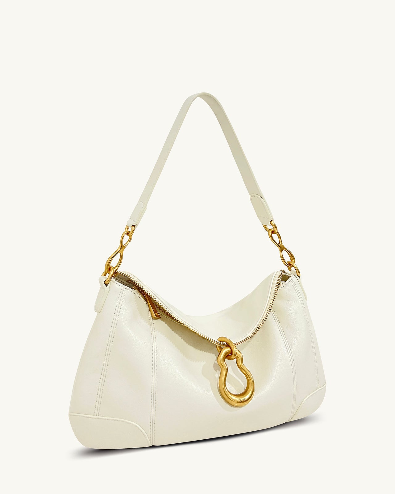 Sac bandoulière Jayla orné d’un pendentif en métal – Blanc