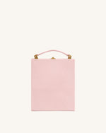Sac Pochette Taya en forme de livre avec motif perroquet tropical – Rose