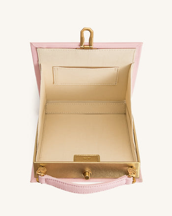 Sac Pochette Taya en forme de livre avec motif perroquet tropical – Rose