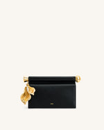 Pochette Holly ornée d'un pendentif en métal - Noir