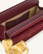 Pochette Holly en daim synthétique ornée d'un pendentif en métal - Brun rougeâtre