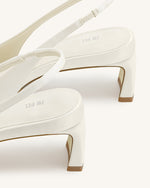 Escarpins à bride arrière Queena avec appliques florales - Blanc ivoire