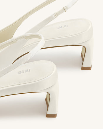 Escarpins à bride arrière Queena avec appliques florales - Blanc ivoire