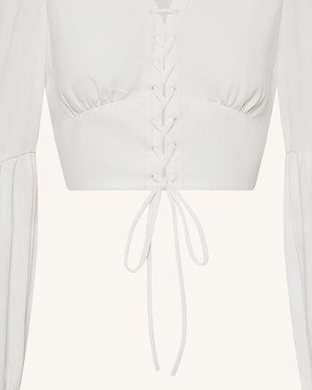 Blouse courte en mousseline à manches lanternes à nouer sur le devant - Blanc